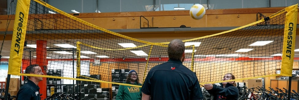 People playing Crossnet game indoors Edmonton Alberta