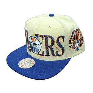 Mitchell & Ness Men's NHL Edmonton Oilers Across The Board Flatbrim Snapback Hat Cream/Blue